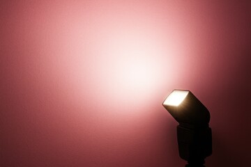 Poster - Pink wall illuminated by a flash of light