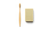 © Pemari - Eco-friendly bamboo toothbrush with natural bristles and beige soap bar arranged side by side on transparent background, representing sustainable hygiene and zero-waste lifestyle