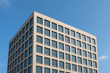 Poster - A contemporary structure featuring numerous glass panels under a clear sky, viewed from a low perspective