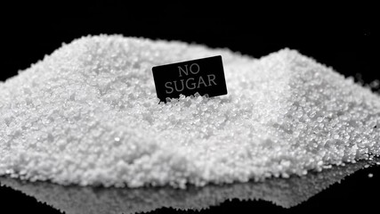 Poster - Sugar crystals spilling across glossy dark background, contrasting near minimalist black sugar free warning indicators, representing nutritional awareness