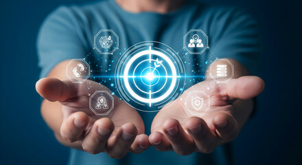 Poster - Person's hands hold glowing digital target with icons, representing business strategy, technology, and data management, showcasing goal achievement and innovation