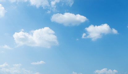Wall Mural - background of blue sky with some white clouds