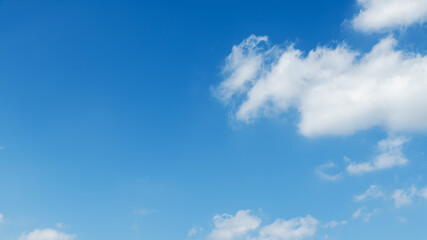 Wall Mural - background of blue sky with some white clouds