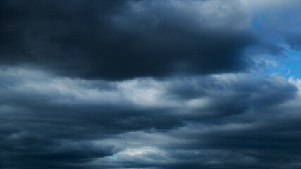Wall Mural - Dark stormy clouds in the sky