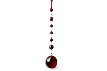 Poster - Vivid red liquid dropping, creating expanding spherical droplets against transparent surface, perfect for design compositions