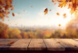 Rustic Wooden Table with Falling Autumn Leaves and Blurred City Background