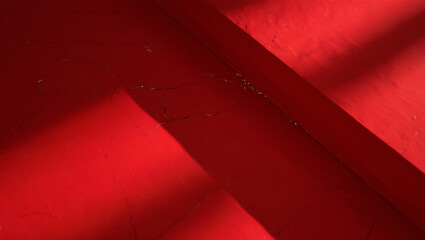 Poster - Angled red surface with shadows and subtle texture creating a geometric abstract design element view