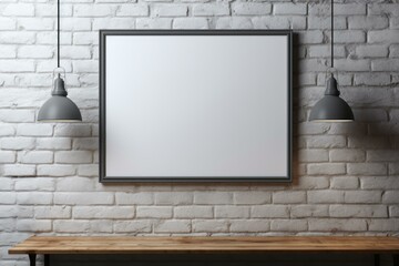 Poster - Empty frame hanging on a white brick wall, illuminated by two hanging lamps, with a wooden table underneath, creating a modern and minimalist interior design