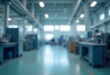 © Mahmuda - Industrial Factory Interior with Blurred Background and Negative Space for Text – Modern Manufacturing Environment