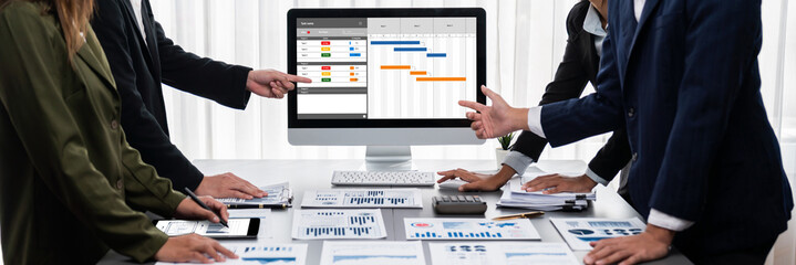 Poster - panorama shot analyst team utilizing bi fintech to analyze financial report with laptop. businesspeo