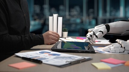Poster - a futuristic office scene showcasing a humanoid robot hand engaged with a tablet, collaborating with