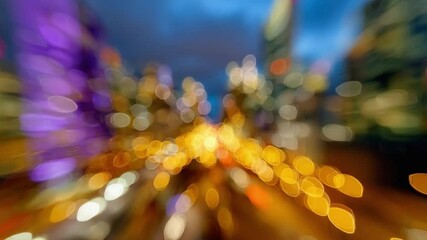 Poster - Urban Nocturne: A vibrant blur of city lights paints an abstract vision of a dynamic cityscape at night, a symphony of color and motion.