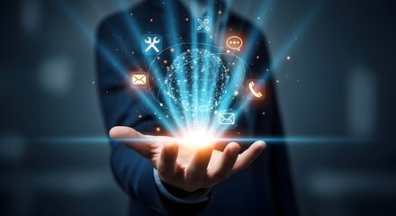A person's hand displays a glowing orb with digital communication icons, showcasing modern technology and connectivity.