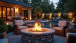 © Maryna - Evening backyard scene with fire pit. Cozy outdoor setting, patio furniture around fire. Warm lighting creates relaxing ambience. Swimming pool in background. Home residential luxury design for