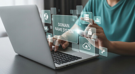 Aufkleber - Person typing on a laptop with domain name system icons floating above the keyboard and hands visible