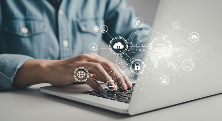 Aufkleber - Person typing on laptop with cloud and security icons overlayed on the screen and around the hands