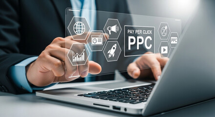 Poster - Man using laptop with pay per click interface and business icons overlaying the screen display area