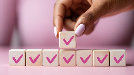 Poster - Modern Productivity Concept with Hand Adding Final Checkmark on Wooden Blocks Progress Tracker for Efficient Project Management and Goal Completion
