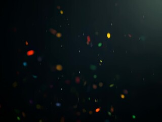 Poster - Multicolored confetti falling against a dark background, creating a festive and celebratory atmosphere