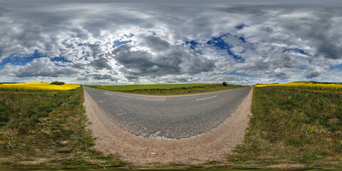 Wall Mural - spherical 360 hdri panorama on old asphalt road with cracks with clouds and sun on blue sky in equirectangular seamless projection, as sky replacement in drone panoramas, skybox game development