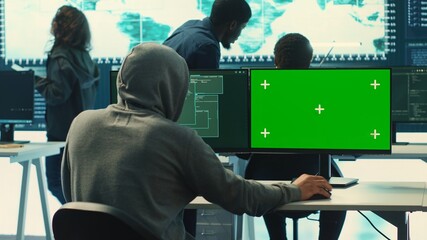 Poster - Professional team of governmental hackers conducting cyber surveillance, looks at isolated copy space screen. Expert examines cybersecurity measures and online security in high tech agency. Camera A.