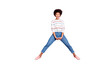 © deagreez - Full length body size photo of cute nice black woman jumping up doing splits with hands folded expressing joyfulness with face in jeans denim sweater isolated over pink pastel color background
