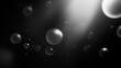 © MR CREATOR - Floating spheres in a dark space with light reflecting off of them creating a monochrome abstract scene