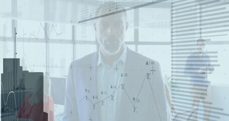 Poster - Analyzing financial graph, businessman in office focusing on data and image