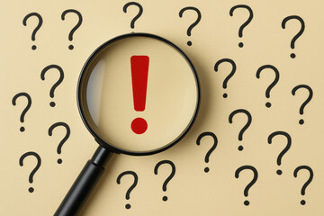 Poster - A magnifying glass focuses on a red exclamation mark among scattered question marks symbolizing clarity and decisive insight in uncertainty