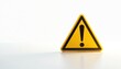© miss irine - Yellow triangle warning sign with exclamation point, isolated on white. Symbol of caution, hazard, risk, or danger. Suitable for various safety and emergency concepts.