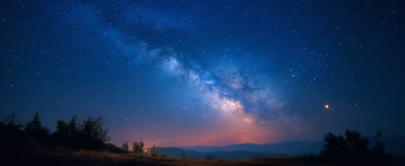 Wall Mural - milky way across night sky over hills