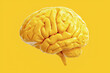 © Irina - A bright yellow brain is featured against a matching background, symbolizing creativity and mental wellness, emphasizing the importance of cognitive health.