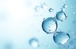 © miss irine - Close-up of blue water molecules floating. Transparent spheres with bubbles, light reflections. Abstract background evokes freshness, purity for science projects, tech, eco concepts.