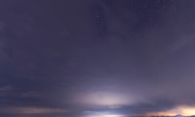 Canvas Print - beautiful night sky background, with long exposure clouds, starry sky.