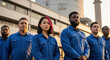 © SteffCunha - Diverse industrial workers team in blue uniforms standing together for teamwork and collaboration success