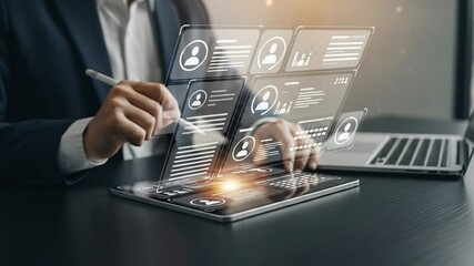 Aufkleber - Person using digital pen on tablet with holographic interface near laptop on desk at work