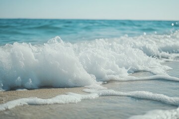 Wall Mural - Captivating slow motion of ocean waves lapping white sand beach under bright sky, White sand beach of perfect ocean coast slow motion of waves crash on shore