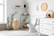© Pixel-Shot - Interior of modern bathroom with ceramic toilet bowl