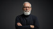 © ui - Portrait of a serious senior man with a beard and glasses, his face showing thoughtful expression