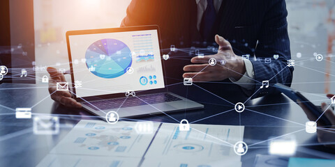 Leinwandbilder - Group of business people meeting in office and communication network concept