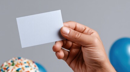 Poster - Hand holding birthday card isolated on white background