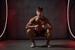 © Abdul - A teenage athlete doing bodyweight squats in a minimalist gym LED rim lighting with strong shadow separation muscle