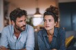 © Vlad - Couple Talking Serious. Modern Interior Apartment Design Discussion
