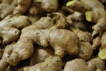 Poster - Close up of a pile of fresh ginger roots, showcasing their unique shapes and textures