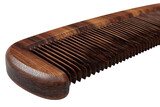Close up of a finely crafted wooden comb with a smooth finish and distinct grain isolated on transparent background