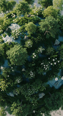 Poster - Aerial view of miniature green landscape with trees and white flowers, depicting a small world or ecosystem, symbolizing nature, environment, and sustainability