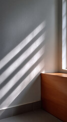 Poster - Sunlight casts diagonal shadows on white textured wall, wooden corner and tiled floor, creating calm minimalist interior scene