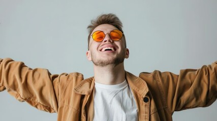 Poster - A person wearing a brown jacket and orange sunglasses, possibly for casual or outdoor activities
