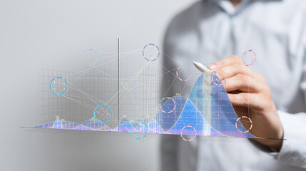 Poster - Stock photo of a person analyzing data graphs, showcasing business growth and insights.