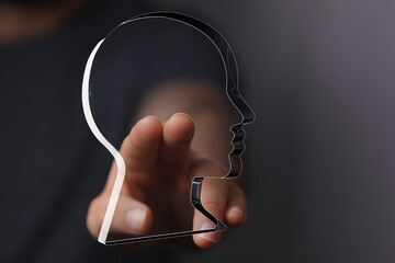 Aufkleber - Abstract image of a hand interacting with a transparent head, symbolizing concepts like mind, thinking, ideas, and mental health.